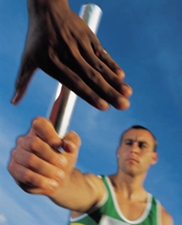 Man handing off baton